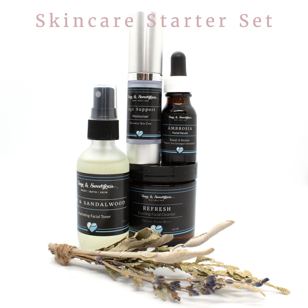 Skincare starter set with bottles and a lavender branch on a white background